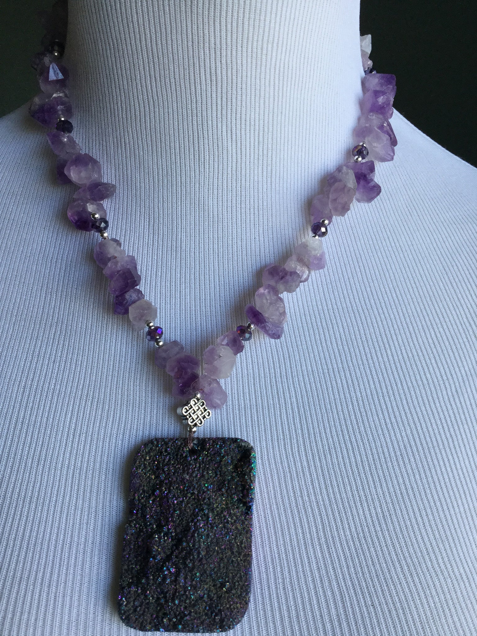 Amethyst with druzy pendant. Sterling silver clasp. Semi precious stones