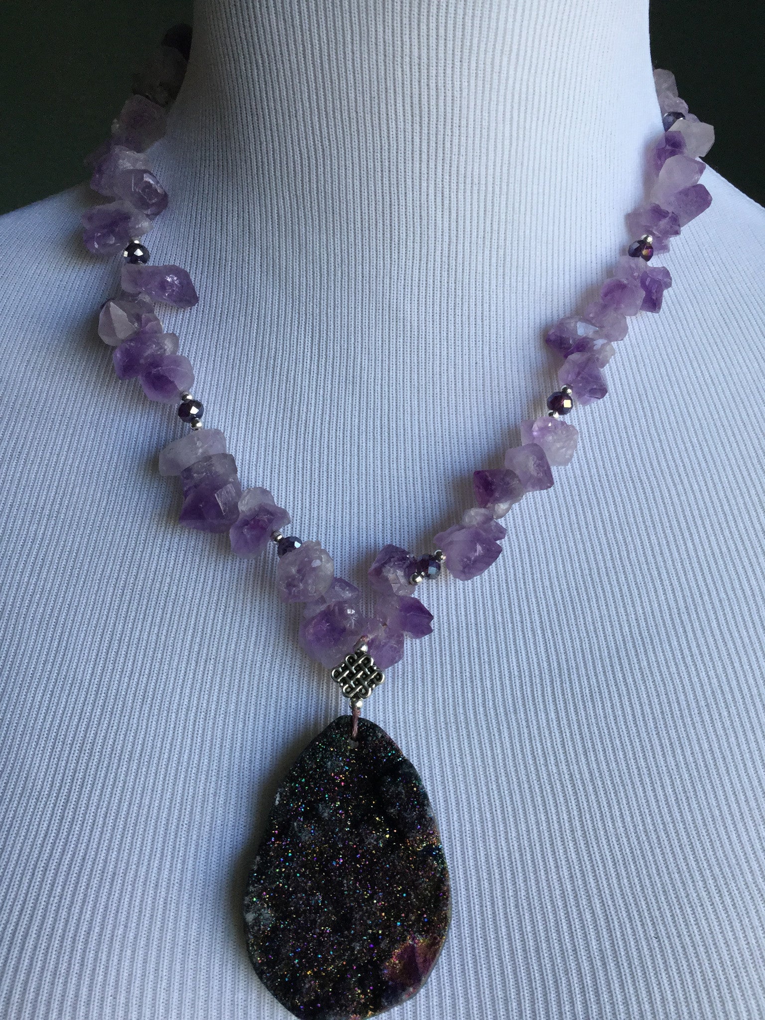 Amethyst with druzy pendant. Sterling silver clasp. Semi precious stones