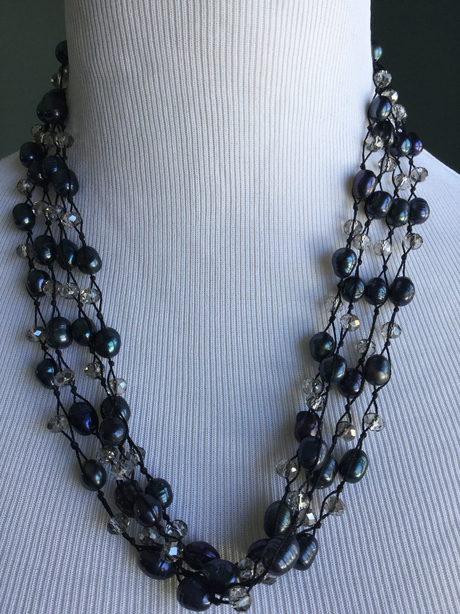 Fresh water pearls quadruple layers and crystals.